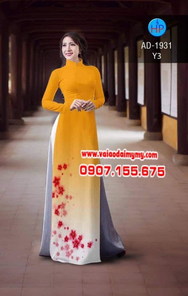 ao-dai-in-hoa-nho-ben-duoi-mau-vang-cam